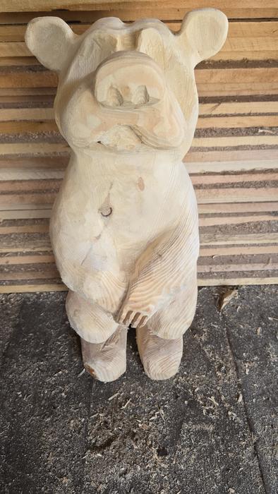 Cartoon bear chainsaw carving