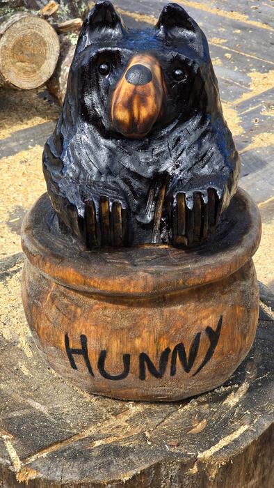 Hunny pot bear cub chainsaw carving